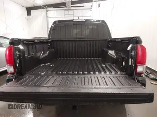 2019 Toyota Tacoma SR with VIN 5TFCZ5AN7KX167511, listed as a IAAI auction lot 42360585 with 65,213 mi miles and . Bid and sale history available at DreamBid. Image 18.
