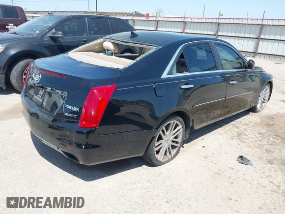 2014 Cadillac CTS Luxury RWD with VIN 1G6AR5SX4E0195791, listed as a IAAI auction lot 42004960 with Not Provided miles. Bid and sale history available at carsss.com. Image 4.