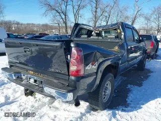 2003 Chevrolet Silverado 2500HD LS with VIN 1GCHK23U93F131856, listed as a IAAI auction lot 41235689 with 101,907 mi miles. Bid and sale history available at carsss.com. Image 4.