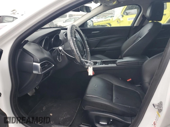 2019 Jaguar XE 25t with VIN SAJAS4FX5KCP51107, listed as a Copart auction lot 44332255 with 101,036 mi miles and Salvage Title. Bid and sale history available at carsss.com. Image 7.