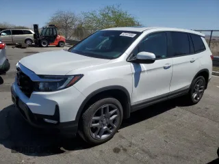 2023 Honda Passport EX-L with VIN 5FNYF8H54PB029786, listed as a Copart auction lot 52107155 with 10,905 mi miles and Salvage Title. Bid and sale history available at carsss.com. Image 1.