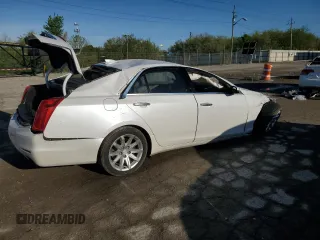 2015 Cadillac CTS RWD with VIN 1G6AP5SXXF0136820, listed as a Copart auction lot 54666385 with 129,763 mi miles and Clean title. Bid and sale history available at DreamBid. Image 3.