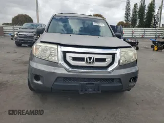 2009 Honda Pilot LX with VIN 5FNYF382X9B028461, listed as a Copart auction lot 52068575 with 189,267 mi miles and Salvage title. Bid and sale history available at DreamBid. Image 5.