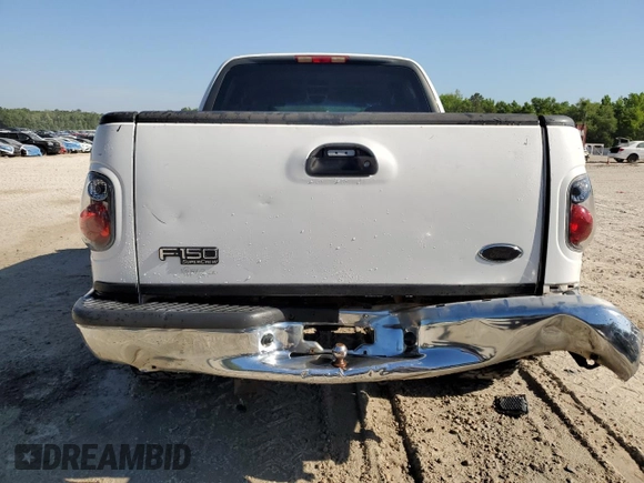 2001 Ford F-150 XLT with VIN 1FTRW07W11KB44405, listed as a Copart auction lot 53560595 with 272,881 mi miles and Salvage title. Bid and sale history available at DreamBid. Image 6.