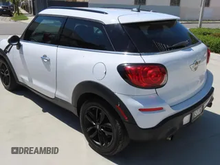 2015 MINI Paceman S z VIN WMWSS7C54FWS44675, wystawiony jako Copart lot #58866555 z przebiegiem 77 663 mil mil oraz Czysty tytuł • Clean title. Historia ofert i sprzedaży dostępna na DreamBid. Obrazek 3.