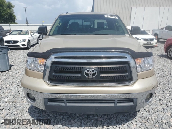 2010 Toyota Tundra с VIN 5TFRY5F14AX093529, выставлен на аукционе Copart как лот 60121455 с пробегом 174 997 миль миль и Списание • Salvage title. История ставок и продаж доступна на DreamBid. Изображение 5.