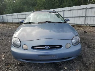 1999 Ford Taurus SE z VIN 1FAFP58S2XA261374, wystawiony jako Copart lot #74180494 z przebiegiem 193 416 mil mil oraz Szkody całkowita. Historia ofert i sprzedaży dostępna na DreamBid. Obrazek 5.