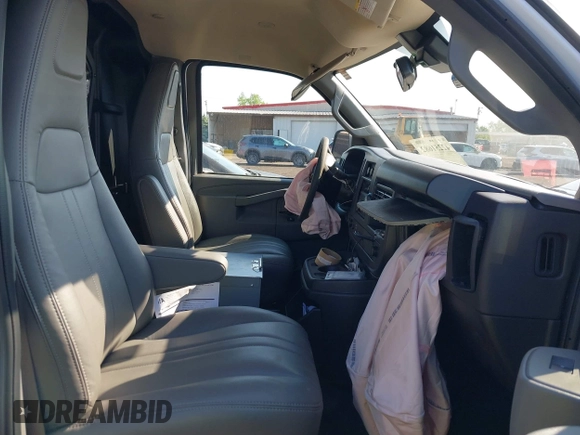 2024 Chevrolet Express Cargo with VIN 1GCWGAFP0R1250412, listed as a IAAI auction lot 42251682 with 9,199 mi miles and . Bid and sale history available at DreamBid. Image 5.