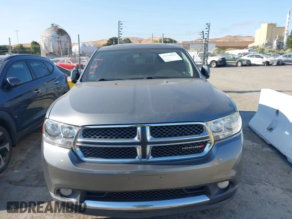 2012 Dodge Durango SXT with VIN 1C4RDJAG2CC271772, listed as a IAAI auction lot 42760810 with 151,215 mi miles and . Bid and sale history available at DreamBid. Image 6.