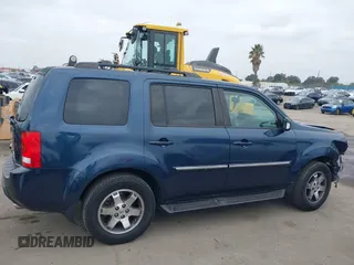 2009 Honda Pilot Touring with VIN 5FNYF48929B040199, listed as a IAAI auction lot 41466006 with 167,959 mi miles and . Bid and sale history available at carsss.com. Image 14.