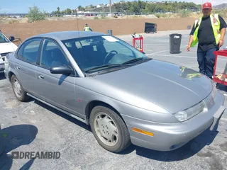 1997 Saturn SL с VIN 1G8ZJ5279VZ255030, выставлен на аукционе IAAI как лот 42779507 с пробегом 239 484 миль миль и . История ставок и продаж доступна на DreamBid. Изображение 1.