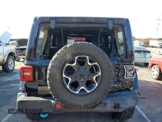 2022 Jeep Wrangler Unlimited Rubicon with VIN 1C4JJXR64NW198894, listed as a Copart auction lot 49899255 with 25,120 mi miles and Salvage title. Bid and sale history available at DreamBid. Image 6.