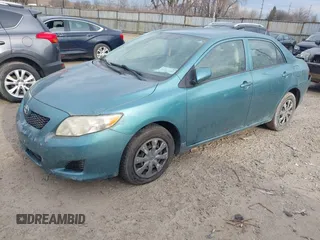 2009 Toyota Corolla with VIN 2T1BU40E29C151330, listed as a IAAI auction lot 41911186 with 137,738 mi miles. Bid and sale history available at carsss.com. Image 2.
