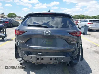 2020 Mazda CX-5 Touring with VIN JM3KFACM9L0826742, listed as a IAAI auction lot 41903755 with 73,409 mi miles and . Bid and sale history available at DreamBid. Image 17.