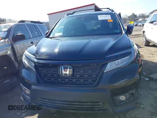 2019 Honda Passport Elite z VIN 5FNYF8H07KB014647, wystawiony jako IAAI lot #41544464 z przebiegiem 82 698 mil mil oraz . Historia ofert i sprzedaży dostępna na DreamBid. Obrazek 12.
