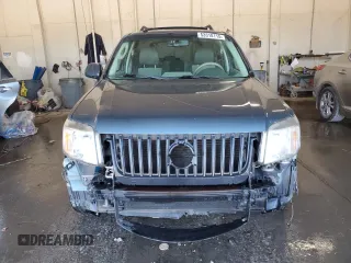 2010 Mercury Mariner Premier z VIN 4M2CN8HG3AKJ29557, wystawiony jako Copart lot #53318115 z przebiegiem 141 895 mil mil oraz Szkoda całkowita • Salvage title. Historia ofert i sprzedaży dostępna na DreamBid. Obrazek 5.