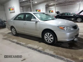 2002 Toyota Camry LE z VIN 4T1BE32K32U063577, wystawiony jako Copart lot #58782185 z przebiegiem 243 589 mil mil oraz Szkoda całkowita • Salvage title. Historia ofert i sprzedaży dostępna na DreamBid. Obrazek 4.