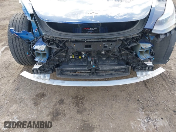 2022 Tesla Model 3 with VIN 5YJ3E1EA7NF188417, listed as a IAAI auction lot 41885623 with 105,457 mi miles and . Bid and sale history available at DreamBid. Image 6.