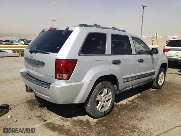 2005 Jeep Grand Cherokee Laredo with VIN 1J4HR48N55C600173, listed as a Copart auction lot 49164965 with 84,100 mi miles and Salvage Title. Bid and sale history available at carsss.com. Image 3.