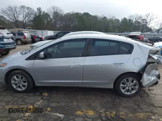 2010 Honda Insight EX with VIN JHMZE2H77AS022538, listed as a IAAI auction lot 41804579 with 184,000 mi miles and . Bid and sale history available at DreamBid. Image 13.