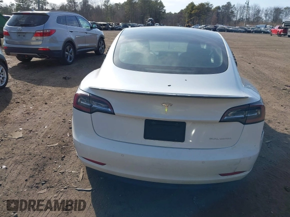 2021 Tesla Model 3 Long Range with VIN 5YJ3E1EB2MF858267, listed as a IAAI auction lot 41782360 with 79,671 mi miles and . Bid and sale history available at DreamBid. Image 16.