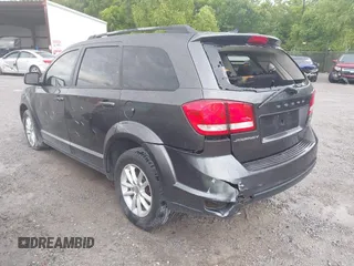 2017 Dodge Journey SXT with VIN 3C4PDCBG7HT588556, listed as a IAAI auction lot 42167063 with 149,397 mi miles and . Bid and sale history available at DreamBid. Image 3.