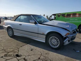 1999 BMW 3 Series 323ic with VIN WBABJ7333XEA17621, listed as a Copart auction lot 71743504 with 108,354 mi miles and Salvage Title. Bid and sale history available at carsss.com. Image 4.