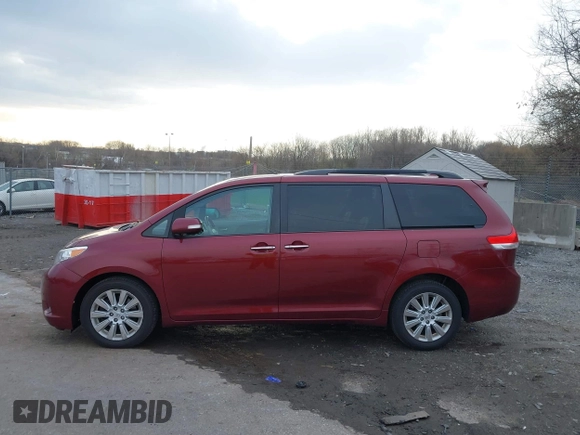 2013 Toyota Sienna XLE with VIN 5TDDK3DC1DS068215, listed as a IAAI auction lot 41610737 with 168,186 mi miles and . Bid and sale history available at DreamBid. Image 14.
