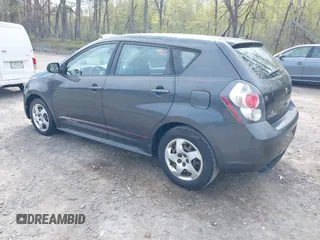 2009 Pontiac Vibe w/1SA with VIN 5Y2SL67859Z404323, listed as a IAAI auction lot 42172647 with 179,874 mi miles. Bid and sale history available at carsss.com. Image 3.
