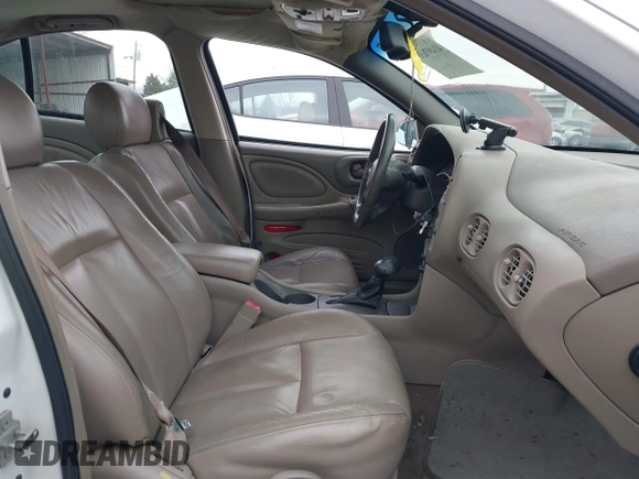 2004 Pontiac Bonneville SLE z VIN 1G2HY52K54U215710, wystawiony jako IAAI lot #41497635 z przebiegiem 123 343 mil mil oraz . Historia ofert i sprzedaży dostępna na DreamBid. Obrazek 5.