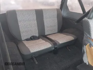 1986 Suzuki Samurai z VIN JS4JC51C4G4118117, wystawiony jako IAAI lot #41589925 z przebiegiem 70 607 mil mil oraz . Historia ofert i sprzedaży dostępna na DreamBid. Obrazek 8.