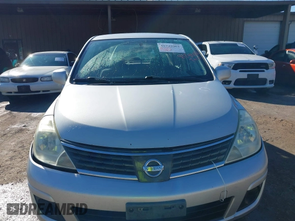 2009 Nissan Versa 1.8 S with VIN 3N1BC11E09L380119, listed as a IAAI auction lot 41742061 with 161,893 mi miles. Bid and sale history available at carsss.com. Image 6.