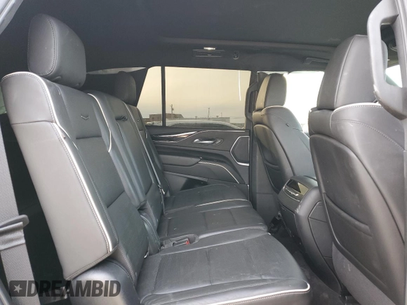 2022 Cadillac Escalade Sport z VIN 1GYS3FKL1NR119585, wystawiony jako Copart lot #85219804 z przebiegiem 36 197 mil mil oraz Szkoda całkowita • Salvage title. Historia ofert i sprzedaży dostępna na DreamBid. Obrazek 11.