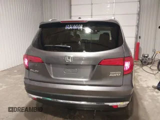 2017 Honda Pilot Touring with VIN 5FNYF6H91HB084737, listed as a IAAI auction lot 41608145 with 86,696 mi miles. Bid and sale history available at carsss.com. Image 16.