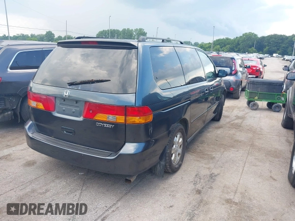 2004 Honda Odyssey EX-L with VIN 5FNRL189X4B045459, listed as a IAAI auction lot 42628246 with 181,328 mi miles and . Bid and sale history available at DreamBid. Image 4.