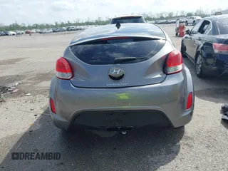 2013 Hyundai Veloster w/Black Int with VIN KMHTC6AD6DU169765, listed as a IAAI auction lot 41928516 with 130,708 mi miles and . Bid and sale history available at DreamBid. Image 16.