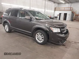 2017 Dodge Journey SXT z VIN 3C4PDDBG1HT512398, wystawiony jako IAAI lot #42098784 z przebiegiem 123 946 mil mil oraz . Historia ofert i sprzedaży dostępna na DreamBid. Obrazek 1.