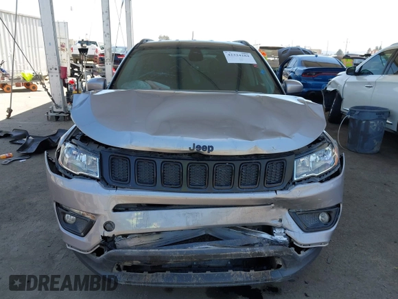 2019 Jeep Compass Latitude with VIN 3C4NJDBB4KT754484, listed as a IAAI auction lot 42324284 with 85,637 mi miles and . Bid and sale history available at DreamBid. Image 12.
