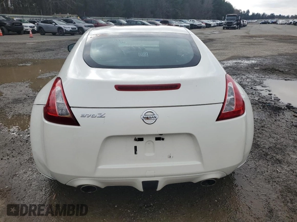 2012 Nissan 370Z z VIN JN1AZ4EHXCM562486, wystawiony jako Copart lot #44594005 z przebiegiem 79 150 mil mil oraz Szkoda całkowita • Salvage title. Historia ofert i sprzedaży dostępna na DreamBid. Obrazek 6.