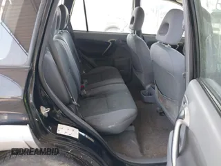 2003 Toyota RAV4 z VIN JTEGH20V030086991, wystawiony jako IAAI lot #42206744 z przebiegiem 214 869 mil mil oraz . Historia ofert i sprzedaży dostępna na DreamBid. Obrazek 8.