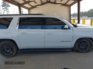 2019 Chevrolet Suburban LT with VIN 1GNSKHKC2KR384572, listed as a IAAI auction lot 42118571 with Not Provided miles and . Bid and sale history available at DreamBid. Image 12.