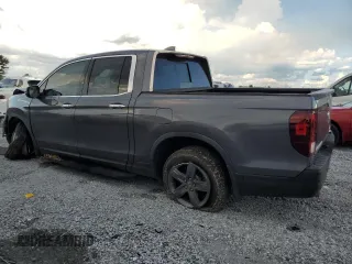 2023 Honda Ridgeline RTL-E with VIN 5FPYK3F79PB010418, listed as a Copart auction lot 62272845 with 39,739 mi miles and Salvage title. Bid and sale history available at DreamBid. Image 2.
