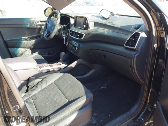 2019 Hyundai Tucson SE with VIN KM8J2CA46KU073107, listed as a IAAI auction lot 41648453 with 58,417 mi miles. Bid and sale history available at carsss.com. Image 5.