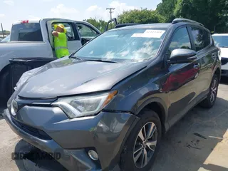 2018 Toyota RAV4 XLE with VIN JTMWFREV9JJ201845, listed as a IAAI auction lot 42442303 with 111,177 mi miles and . Bid and sale history available at DreamBid. Image 2.