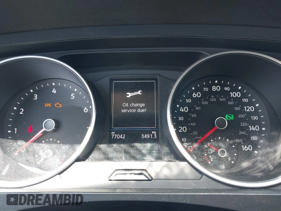 2021 Volkswagen Tiguan S with VIN 3VV1B7AX9MM067347, listed as a IAAI auction lot 42305101 with 77,042 mi miles and . Bid and sale history available at DreamBid. Image 7.