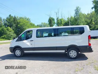 2019 Ford Transit Passenger XL with VIN 1FBZX2ZM4KKA75042, listed as a IAAI auction lot 42786079 with 229,926 mi miles and . Bid and sale history available at DreamBid. Image 14.