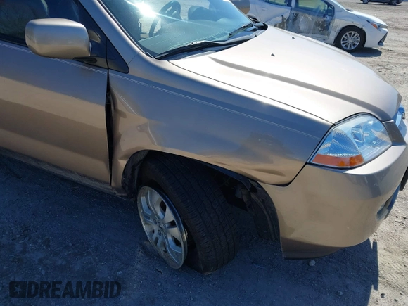 2003 Acura MDX Touring Pkg with VIN 2HNYD18623H549599, listed as a IAAI auction lot 41879934 with 242,896 mi miles. Bid and sale history available at carsss.com. Image 6.