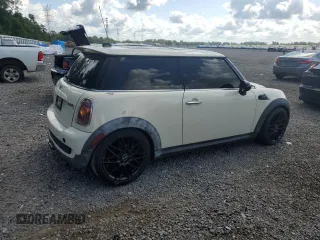 2010 MINI Hardtop S with VIN WMWMF7C5XATW89025, listed as a Copart auction lot 56106705 with 141,216 mi miles and Salvage title. Bid and sale history available at DreamBid. Image 3.