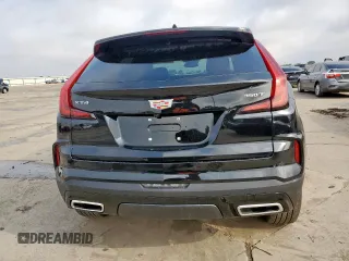 2024 Cadillac XT4 FWD Premium Luxury with VIN 1GYFZCR49RF248341, listed as a Copart auction lot 58586035 with 12,490 mi miles and Salvage title. Bid and sale history available at DreamBid. Image 6.
