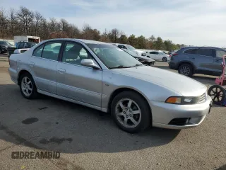 2003 Mitsubishi Galant ES z VIN 4A3AA46H33E035318, wystawiony jako Copart lot #42823255 z przebiegiem 51 373 mil mil oraz Czysty tytuł • Clean title. Historia ofert i sprzedaży dostępna na DreamBid. Obrazek 4.